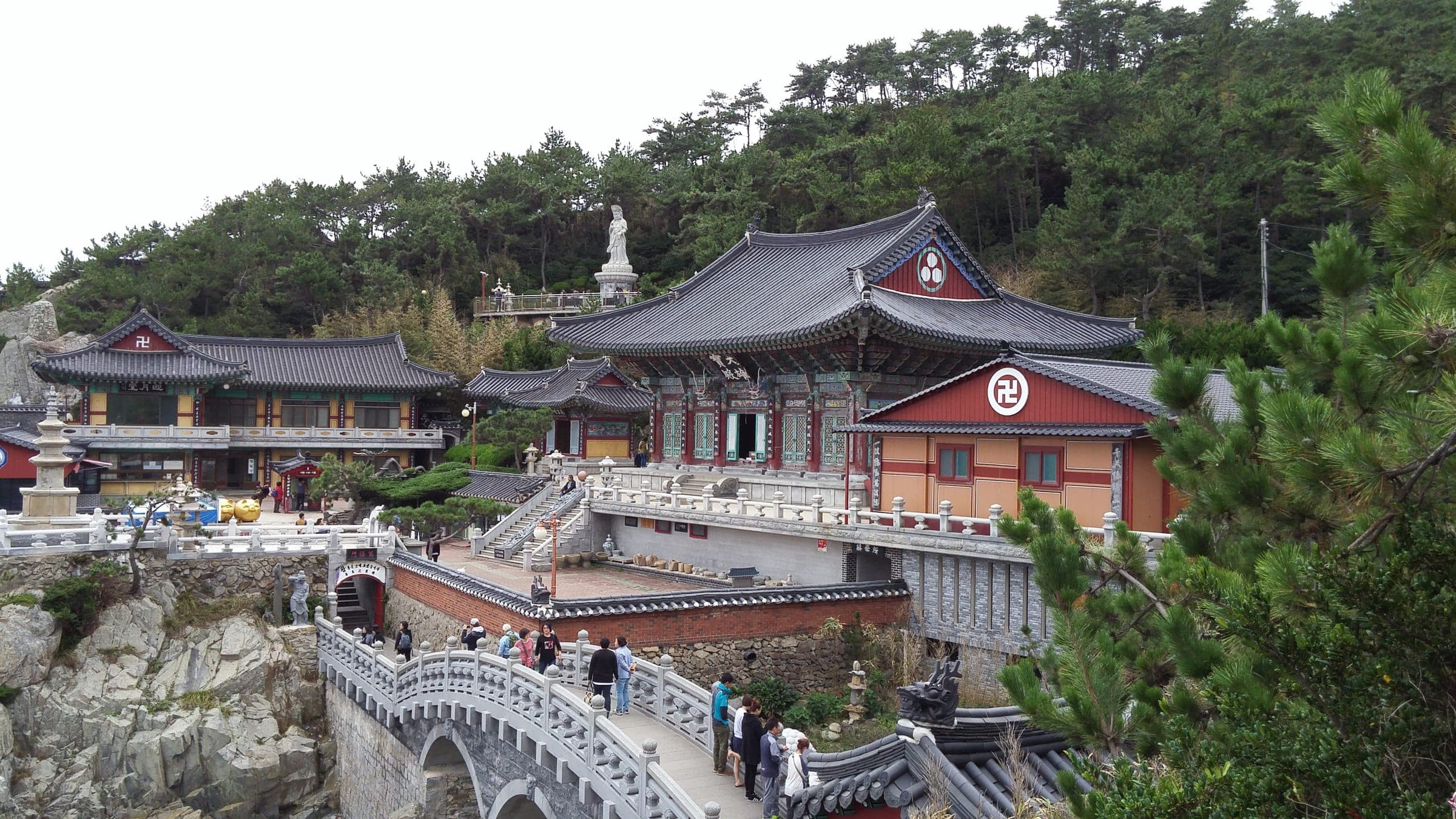 Haedong Yonggungsa temple built on rocks at the edge of the sea near Busan