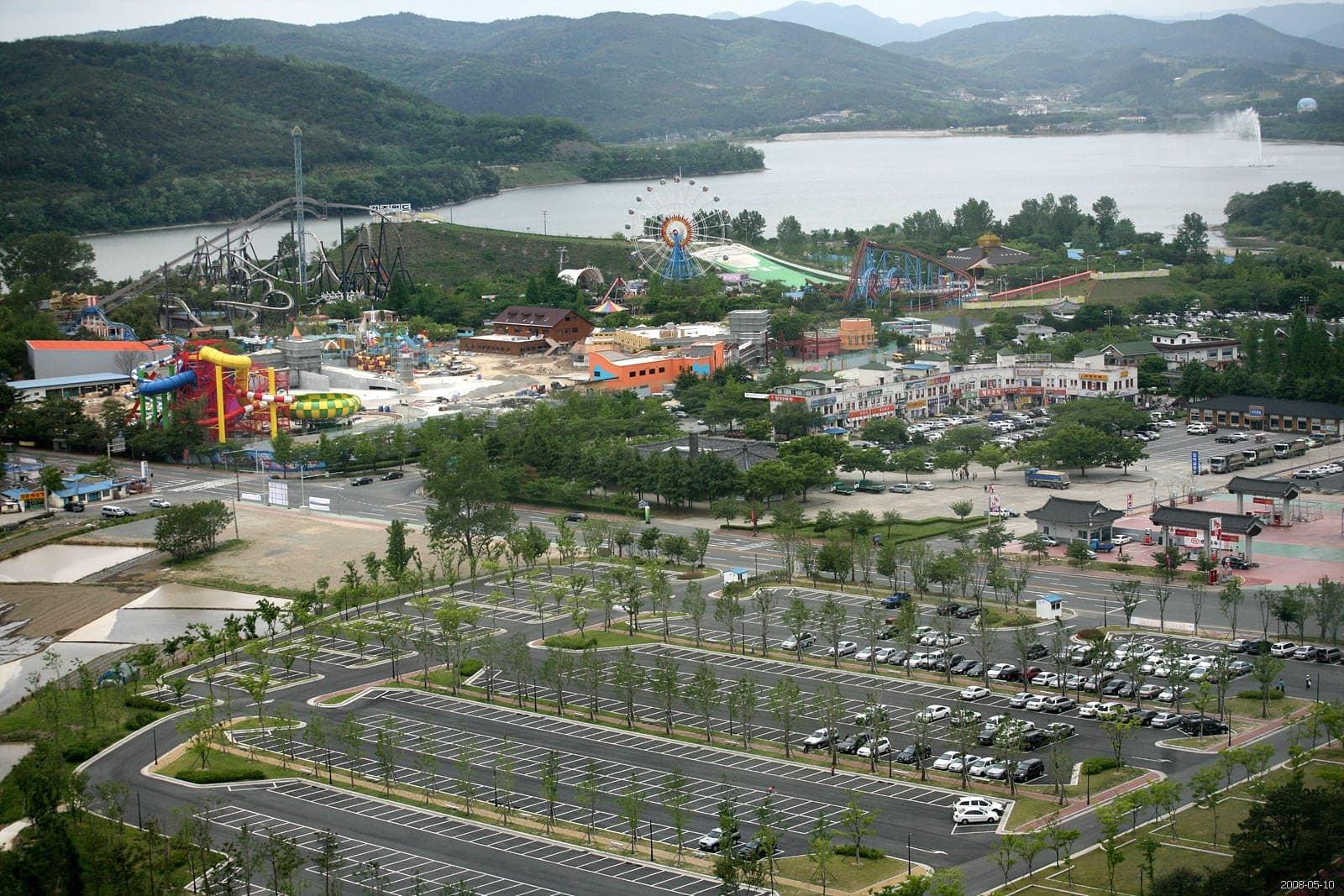 Bomun Lake in Gyeongju from above, with the Gyeongju World amusement park and wide car parks on the shore