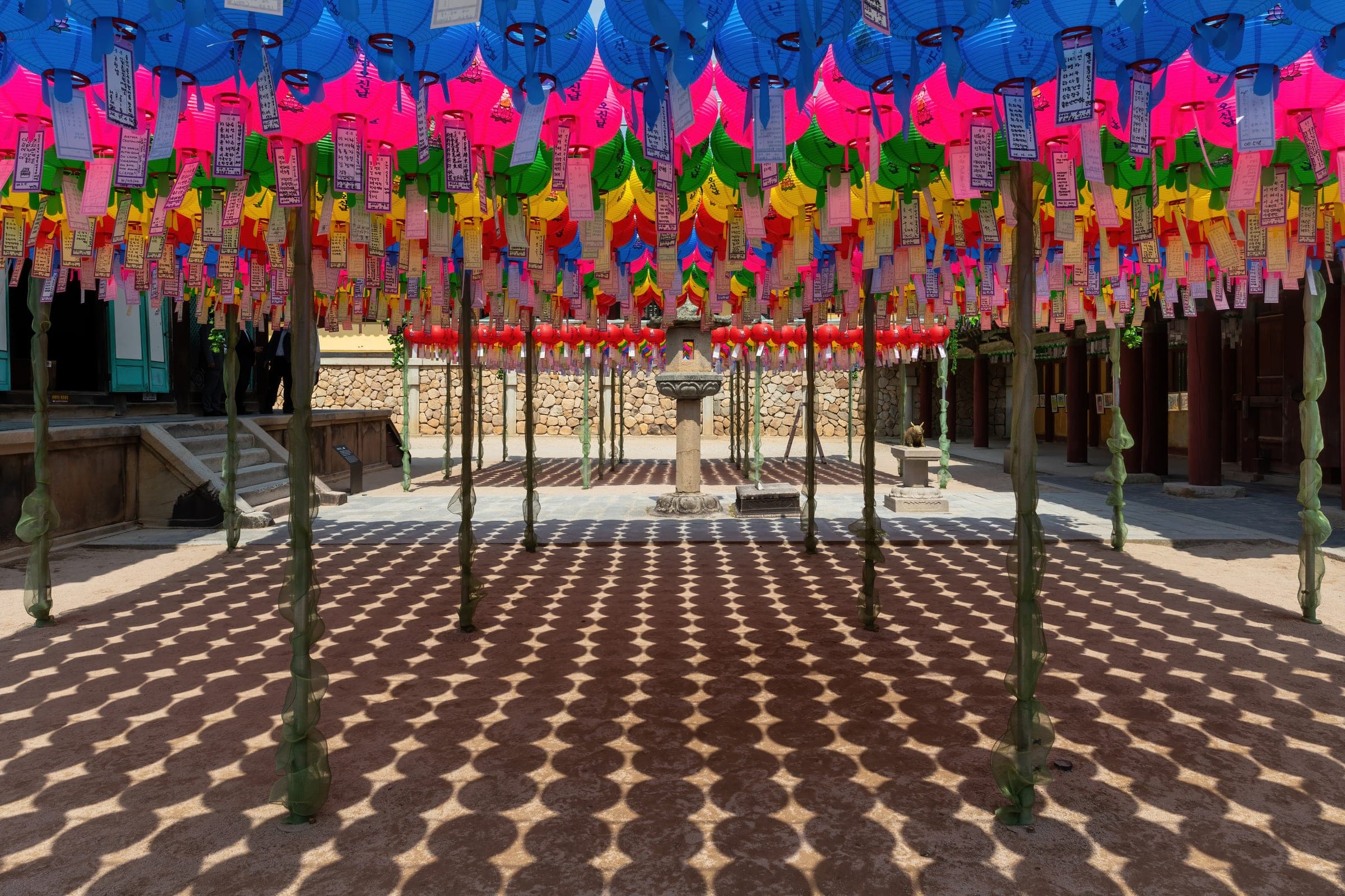 Rows of paper lanterns hanging over a courtyard at Bulguksa temple in Gyeongju